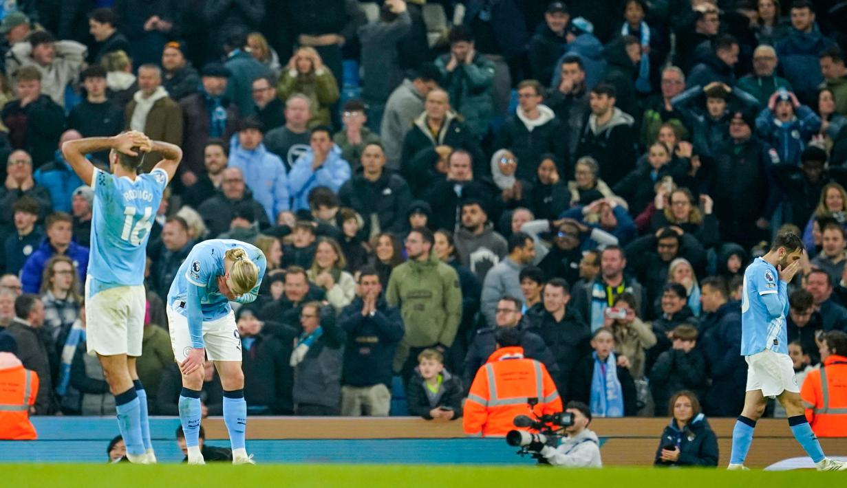 Hasil ini membuat Manchester City tetap berada di peringkat kedua klasemen sementara dengan 60 poin dari 29 laga. Sementara itu Nottingham Forest berhasil keluar dari zona degradasi setelah mengoleksi 28 poin. (AP Photo/Dave Thompson)