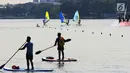 Sejumlah peserta meramaikan Festival Danau Sunter di Jakarta, Minggau (25/2). Kegiatan tersebut untuk mengkampanyaken kebersihan dan menjaga lingkungan danau yang berada di Jakarta. (Liputan6.com/Angga Yuniar)