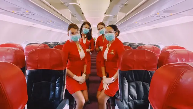 Kru Kabin AirAsia QZ 7520 rute Bandara Internasional Soekarno-Hatta ke Bandara Internasional Ngurah Rai Denpasar Bali. (Dok AirAsia)