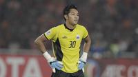 Kiper Persija Jakarta, Rizky Darmawan, saat pertandingan melawan Home United pada laga Piala AFC di SUGBK, Jakarta, Selasa (15/5/2018). Persija takluk 1-3 dari Home United. (Bola.com/M Iqbal Ichsan)