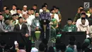 Presiden Joko Widodo atau Jokowi memberi sambutan saat membuka Harlah ke-93 NU di Jakarta, Kamis (31/1). Menurut Jokowi, generasi muda harus memiliki keahlian dan sikap yang dapat membuat kemajuan negara. (Liputan6.com/Angga Yuniar)