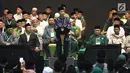 Presiden Joko Widodo atau Jokowi memberi sambutan saat membuka Harlah ke-93 NU di Jakarta, Kamis (31/1). Menurut Jokowi, generasi muda harus memiliki keahlian dan sikap yang dapat membuat kemajuan negara. (Liputan6.com/Angga Yuniar)