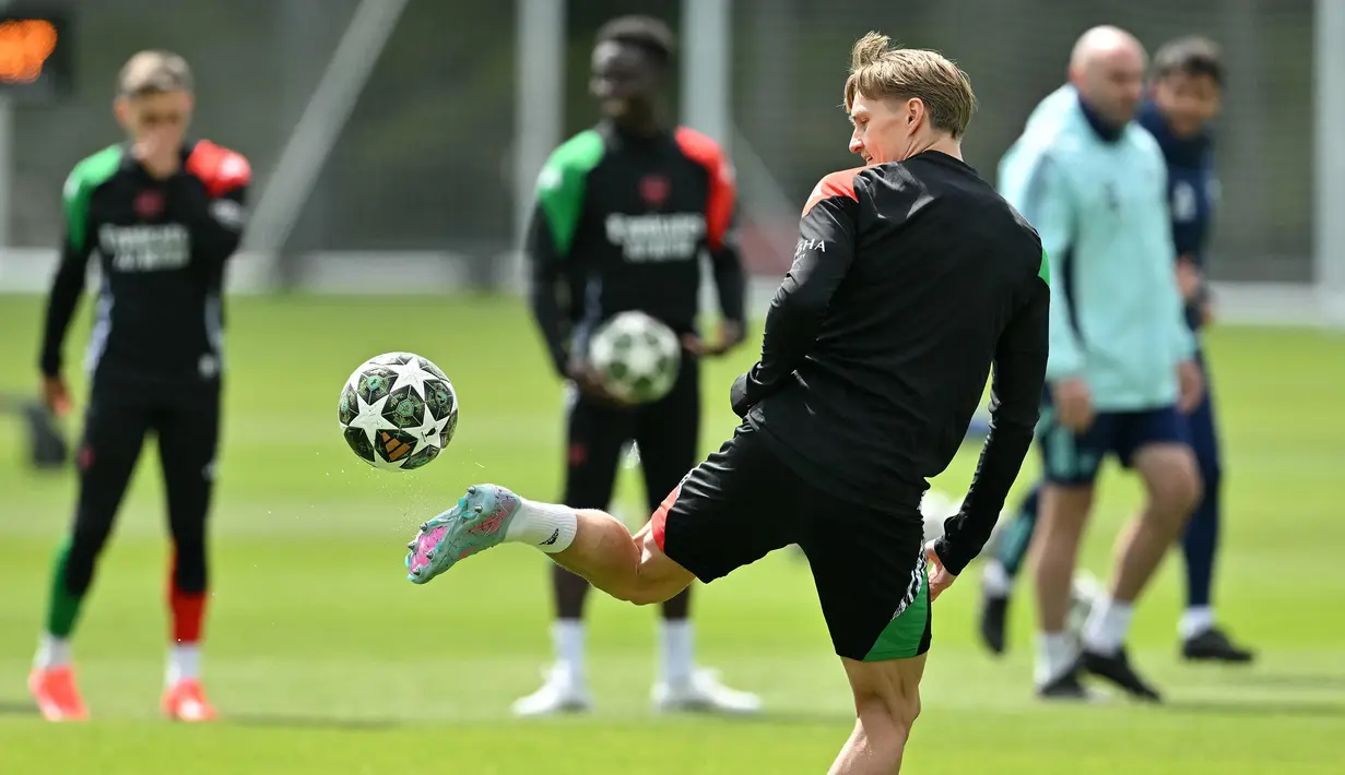 Berlaga tandang ke markas PSG, Arsenal optimistis mampu membalikkan keadaan. (Glyn KIRK/AFP)