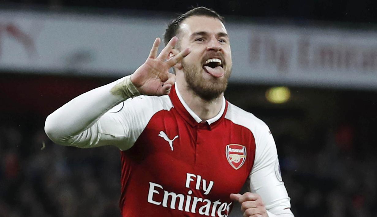 Gelandang Arsenal, Aaron Ramsey membawa bekal hattrick 3 gol ke gawang Everton jelang melawan Tottenham Hotspur, Sabtu (10/2/2018) (AFP/Adrian Dennis)