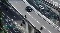 Direktorat Lalu Lintas Polda Metro Jaya telah menghimbau dan melarang pengendara sepeda motor agar tidak melintasi JLNT agar tidak terjadi kecelakaan yang mengakibatkan kematian. (Liputan6.com/Johan Tallo)