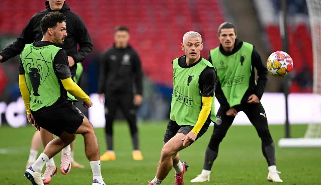 Final Liga Champions 2023/2024 mempertemukan Borussia Dortmund dan Real Madrid. (INA FASSBENDER/AFP)