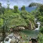 Sejumlah wisatwan sedang menikmati wisata sungai Bondula, Kecamatan Asparaga, Kabupaten Gorontalo. Foto: Istimewa