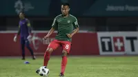 Gelandang Indonesia, Muhammad Hargianto, saat melawan Palestina pada laga Asian Games di Stadion Patriot, Jawa Barat, Rabu (15/8/2018). Indonesia takluk 1-2 dari Palestina. (Bola.com/Vitalis Yogi Trisna)