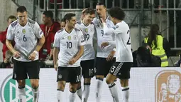 Jerman lolos ke putaran final Piala Dunia 2018 dengan meraih kemenangan dari semua pertandingan grup Group C. (AP/Michael Probst)
