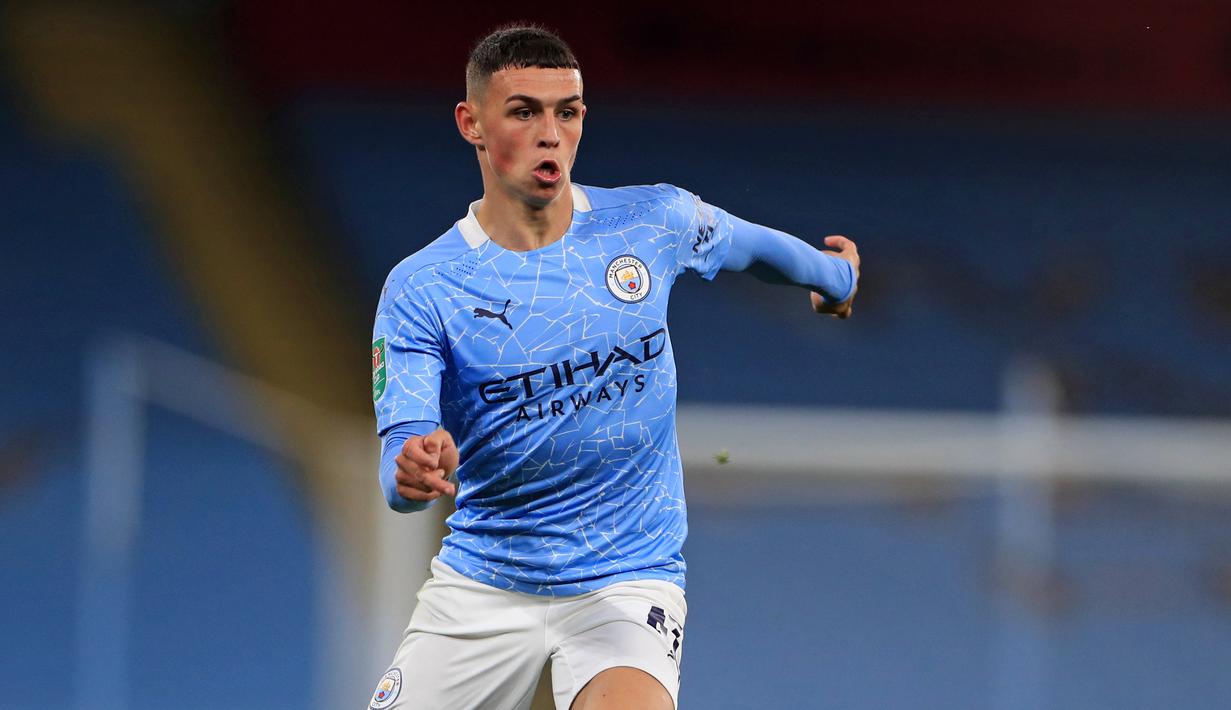 5. Phil Foden (Manchester City) - Kemampuan gelandang berusia 20 tahun ini tidak diragukan lagi di Manchester City. Phil Foden mampu menunjukan kualitasnya di bersama skuat Manchester City. (AFP/Mike Egerton)