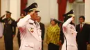 Arinal Djunaidi (kiri) dan Chusnunia Chalim mengikuti pelantikan Gubernur dan Wakil Gubernur Lampung di Istana Negara, Rabu (12/6/2019). Presiden Jokowi melantik Arinal Djunaidi dan Chusnunia Chalim sebagai Gubernur dan Wakil Gubernur Lampung periode 2019-2024. (Liputan6.com/HO/Irwan)