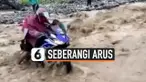 VIRAL, AKSI PRIA SEBERANGI ARUS DERAS DENGAN MOTOR SPORT