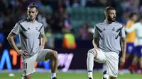 Dua pemain Real Madrid, Gareth Bale (kiri) dan Karim Benzema (kanan). (AFP/Javier Soriano)
