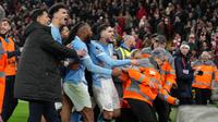 Para pemain Manchester City merayakan kemenangan setelah pertandingan Liga Inggris antara Liverpool dan Manchester City di Liverpool, Inggris, Minggu, 8 Februari 2026. (AP Photo/Jon Super)