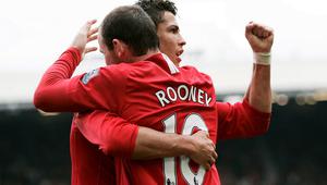 Cristiano Ronaldo dan Wayne Rooney saat masih bersama di Manchester United. (EPA/Magi Haroun)