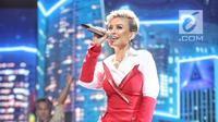 Aksi Agnez Mo saat tampil dalam malam puncak HUT ke-28 SCTV di ICE BSD, Tangerang, Banten, Jumat (24/8). Tema yang diusung dalam Hut ke-28 SCTV adalah The Greatest Celebration. (Liputan6.com/Faizal Fanani)