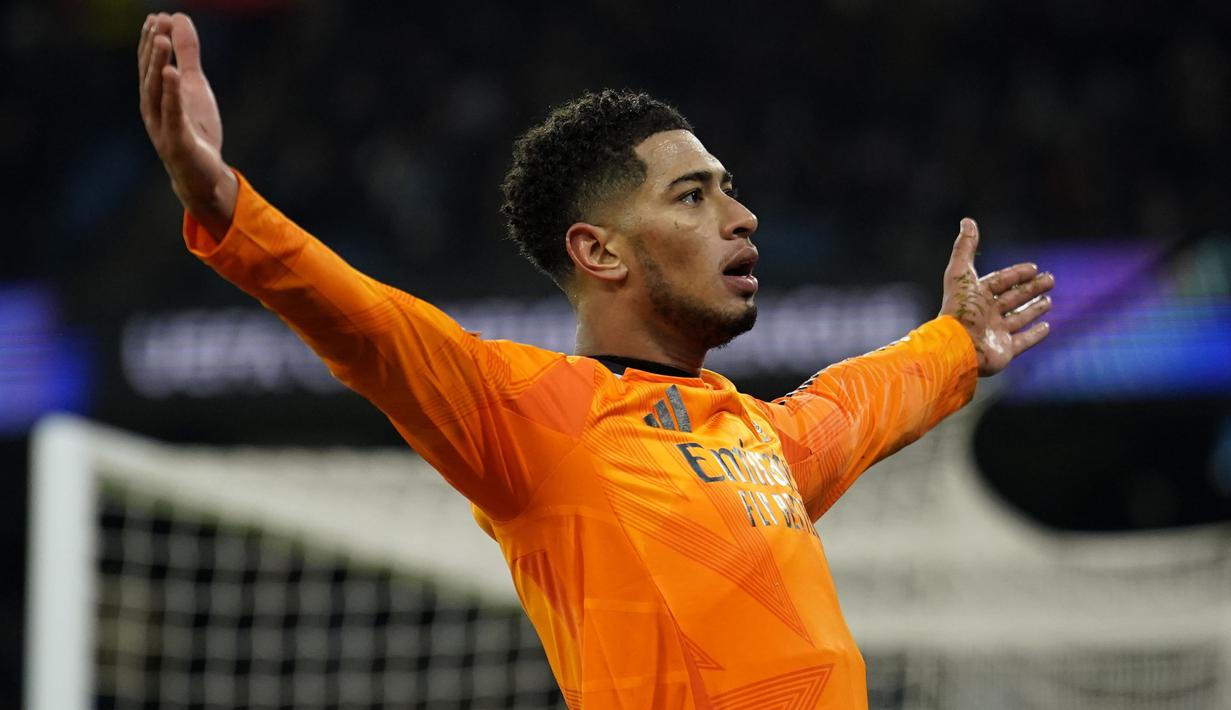 Pemain Real Madrid, Jude Bellingham merayakan gol kemenangan timnya ke gawang Manchester City dalam laga leg 1 babak playoff Liga Champions 2024/2025 di Etihad Stadium, Manchester, Inggris, Rabu (12/02/2025) WIB. (AP Photo/Dave Thompson)