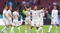 Striker Denmark Martin Braithwaite merayakan gol pertamanya di Euro 2020 / 2021 (AFP)