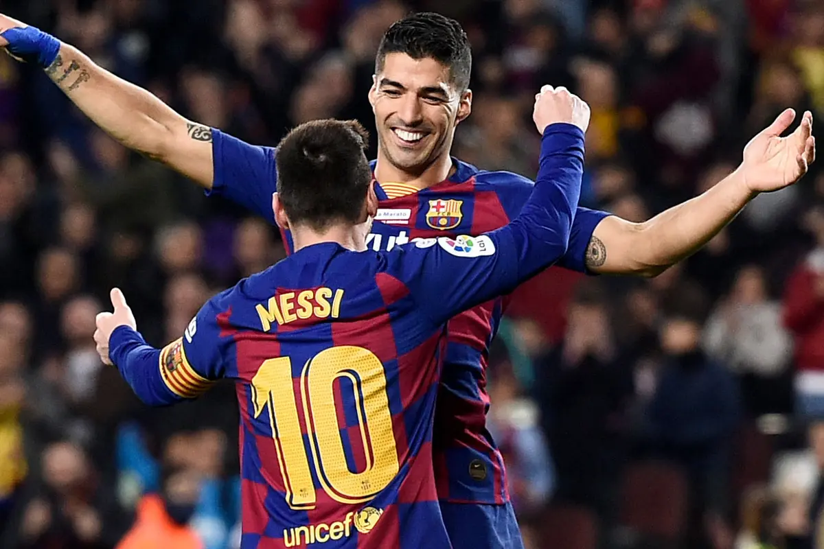 Lionel Messi dan Luis Suarez