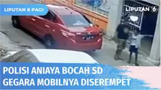 Terekam CCTV, seorang polisi menganiaya bocah SD berusia 10 tahun hanya karena mobilnya terserempet sepeda korban. Bocah malang tersebut dipukul dan ditendang hingga tersungkur.