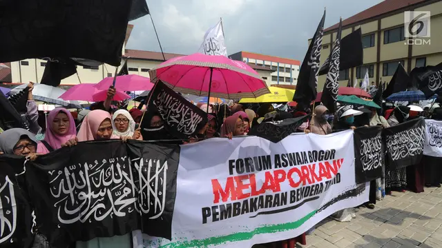 Ratusan Warga Bogor Laporkan Pembakaran Bendera Tauhid di Garut