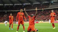 Striker Timnas Belgia, Romelu Lukaku, berselebrasi setelah menjebol gawang San Marino. Belgia menang 9-0 pada laga kualifikasi Piala Eropa 2020 di Brussel (10/10/2019)