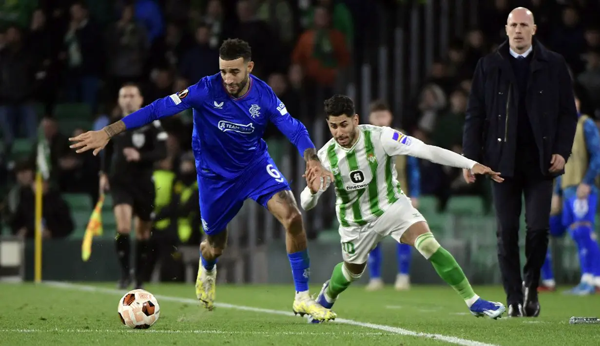 Real Betis harus tersingkir dari ajang Liga Europa usai bertekuk lutut dengan skor 2-3 dari tamunya Glasgow Rangers pada matchday ke-6 Grup C Liga Europa. (CRISTINA QUICLER/AFP)