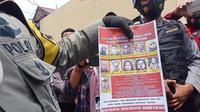 DPO kelompk MIT yang masih dikejar aparat Satgas Madago Raya. Usai tewasnya dua anggota kelompok tersebut dalam baku tembak dengan aparat, tersisa 9 orang lagi yang masih dicari. (Foto: Heri Susanto/ Liputan6.com).