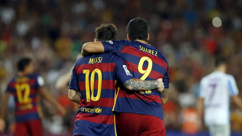 Lionel Messi dan Luis Suarez