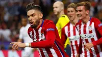 Gelandang Atletico Madrid, Yannick Ferreira Carrasco, merayakan gol ke gawang Real Madrid pada final Liga Champions di San Siro, Milan, Sabtu (28/5/2016). (Reuters/Kai Pfaffenbach)