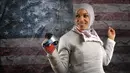 Ibtihaj Muhammad sempat menggemparkan dunia olahraga AS saat ia mewakili Amerika Serikat untuk bertanding di cabang olahraga Anggar. Pasalnya Ia merupakan wanita muslim berhijab pertama yang mewakili Amerika Serikat di ajang Olimpiade. (Foto: AFP/Getty Images/Sean M. Haffey)