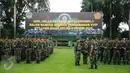 Pasukan TNI bersiap Apel Operasi Pengamanan VVIP KTT Luar Biasa OKI 2016 di Makodam Jaya, Jakarta, Kamis (25/2/2016). 3.600 personil TNI disiagakan untuk pengamanan KTT Luar Biasa OKI ke-3 pada 6-7 Maret 2016 mendatang. (Liputan6.com/Helmi Fithriansyah)