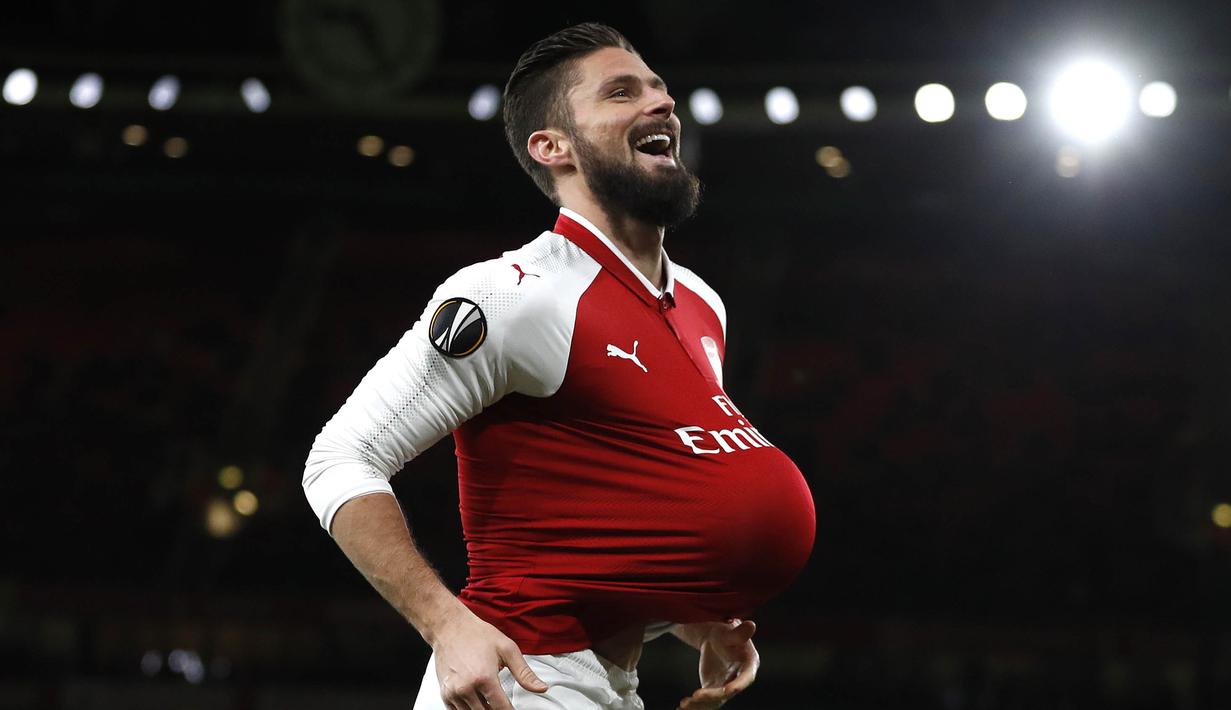 Striker Arsenal, Olivier Giroud, melakukan selebrasi usai mencetak gol ke gawang BATE Borisov pada laga Liga Europa di Stadion Emirates, Jumat (8/12/2017). Arsenal menang 6-0 atas BATE Borisov. (AP/Kirsty Wigglesworth)