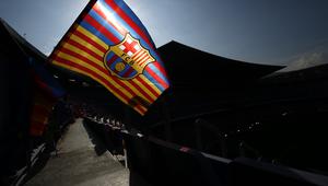 Logo dan ilustrasi Barcelona. (AFP/Pau Barrena)