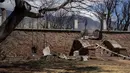Kebakaran tersebut menewaskan sedikitnya 97 orang dan menghancurkan lebih dari 2.000 bangunan, sebagian besar adalah rumah. (AP Photo/Mengshin Lin)