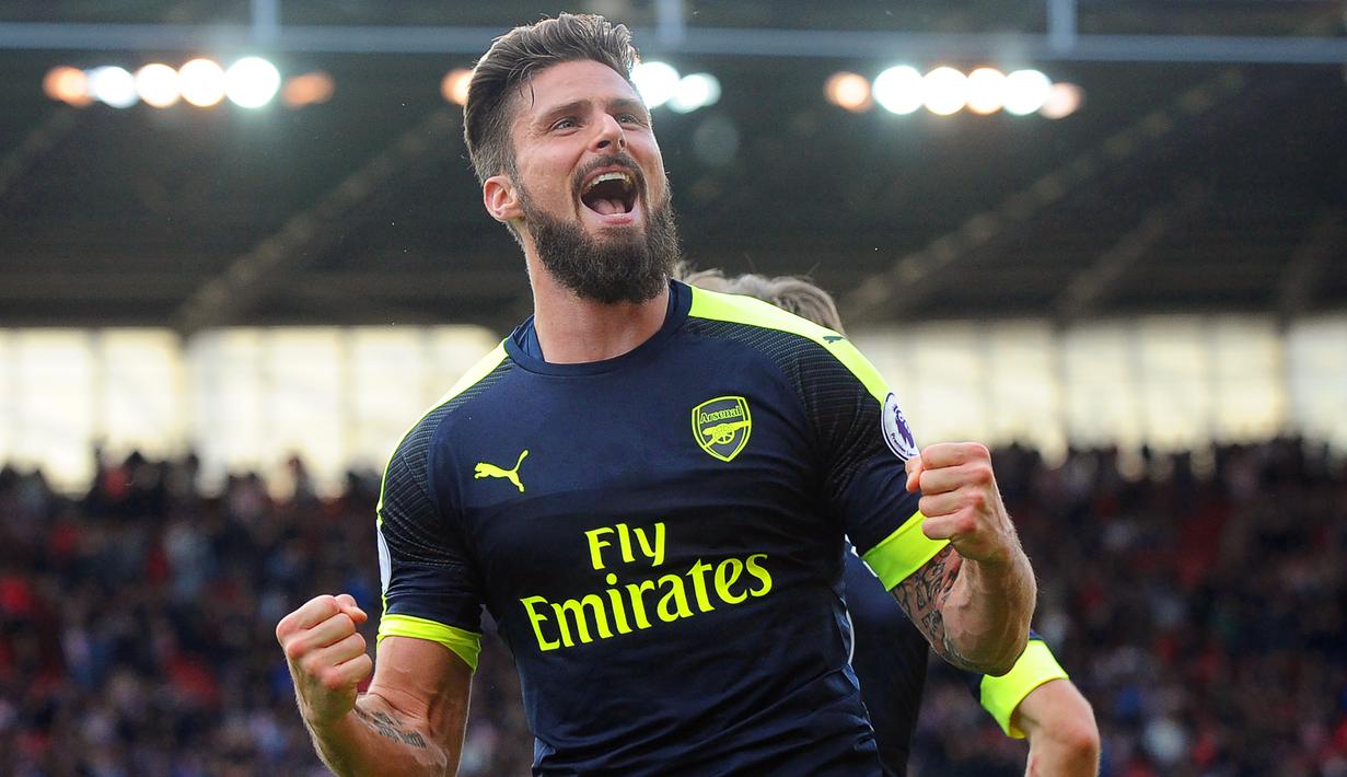 3. Olivier Giroud – Giroud merupakan striker yang memiliki finishing yang brilian. Selama berseragam Arsenal Giroud berhasil mengemas 69 gol dan 27 assists dalam 164 laga. (EPA/Rui Viera)