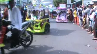 Becak motor hias memeriahkan perayaan Tahun Baru Islam di Gorontalo. (Liputan6.com/Aldiansyah Mochammad Fachrurrozy)