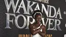 Lupita Nyong'o berpose saat menghadiri pemutaran perdana film Black Panther: Wakanda Forever" di Dolby Theatre di Los Angeles pada Rabu, 26 Oktober 2022. Nyong'o tampil memukau dalam kord putih yang terdiri dari atasan satu bahu yang dipangkas dan rok sepanjang lantai. (Photo by Richard Shotwell/Invision/AP)