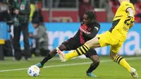 Jeremie Frimpong mampu mengeluarkan permainan terbaiknya sejak kedatangan Xabi Alonso sebagai pelatih. Dengan kecepatan dan kemampuannya ia menjelma menjadi salah satu penyerang paling efektif di Leverkusen. Frimpong telah terlibat langsung dalam sembilan gol dalam 13 penampilan di Bundesliga. Ia juga menyumbang lima gol. (AP Photo/Martin Meissner)