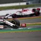 Aksi pembalap Alfa Romeo, Kimi Raikkonen di lintasan Formula 1 (AFP/ Ben STANSALL)