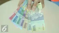 Bank Indonesia (BI) meluncurkan 11 uang rupiah Emisi 2016 dengan gambar pahlawan baru. (Liputan6.com/Fatkhur Rozaq)