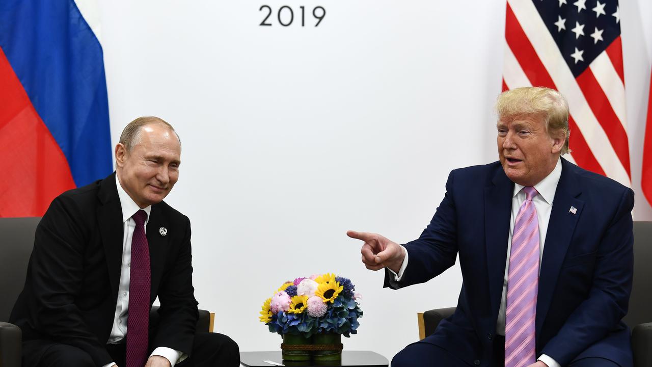 Donald Trump bertemu Vladimir Putin dalam KTT G20 (AFP Photo)