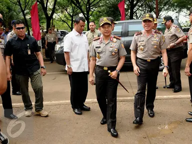 Kapolri Jenderal Tito Karnavian menghadiri peringatan Hari Kesatuan Gerak Bhayangkari ke 64 di Rusun Marunda, Jakarta, Kamis (29/9). Acara itu diisi dengan bakti sosial, seperti perpanjangan SIM, e-KTP dan akta kelahiran. (Liputan6.com/Gempur M Surya)