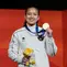 Peraih medali emas Desak Made Rita Kusuma Dewi dari Indonesia berpose di podium saat upacara penyerahan medali final nomor speed putri Asian Games 2026 di Nagoya, Jepang, Rabu (30/9/2026). (AP Photo/Dita Alangkara)