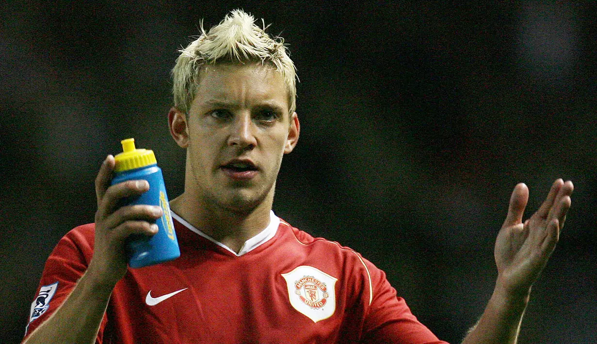 6. Alan Smith - Pemain asal Inggris ini pernah sesumbar tak akan pernah bermain untuk Manchester United. Nasib membawanya ke jalan berbeda, Leeds terdegradasi dan Ia pun merapat ke Old Trafford. (AFP/Paul Ellis)