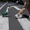 1 of 5 | A duck named Merlin, dressed in a Mexico national soccer team jersey, follows his caretaker Cristian Gomez as they cross the street in Mexico City, Monday, June 15, 2026. (AP Photo/Marco Ugarte)