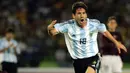 Nomor punggung 18 digunakan Lionel Messi pada awal karier di Timnas Argentina U-20. Bersama nomor tersebut, Messi mampu raih gelar Piala Dunia U-20 pada 2005 silam. Nomor tersebut juga digunakan oleh La Pulga di Timnas senior pada musim 2004/2005, 2006/2007. dan 2008/2009. (Foto: AFP/Luis Acosta)