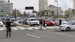 Usai badai Maria di Puerto Rico, lampu lalu lintas belum berfungsi normal. Ratusan polisi turun ke jalan, menjadi pengatur lalu lintas.