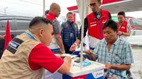 Booth pendaftaran subsidi tepat yang berada di SPBU Jalan Sisingamangaraja, Kecamatan Medan Amplas, Kota Medan, Rabu (1/3/2023) (Reza Efendi/Liputan6.com)