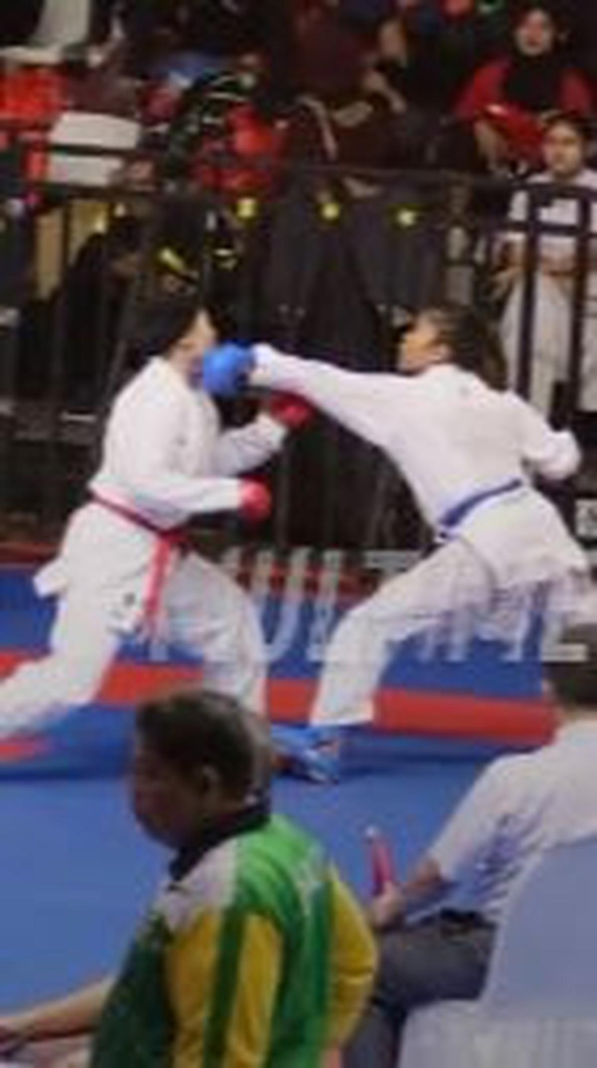 Dia berhasil menyabet Juara I Kumite Putri Kelas Bebas.